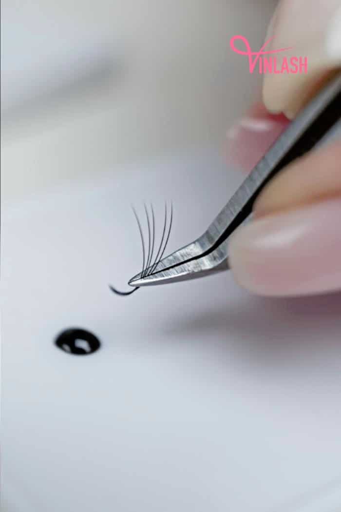 What measures can I take to keep lash fans open during application?